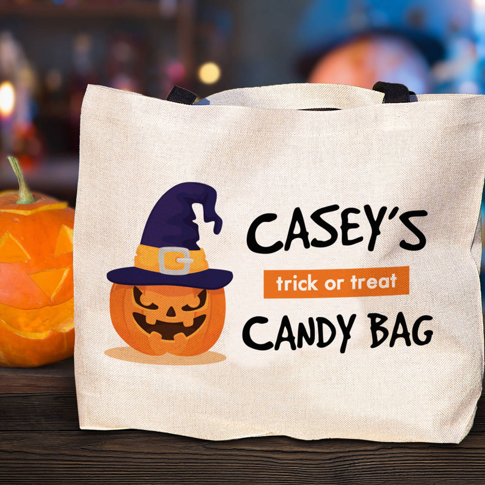 Burlap tote bag customized with halloween jack-o-lantern and personalized with name 