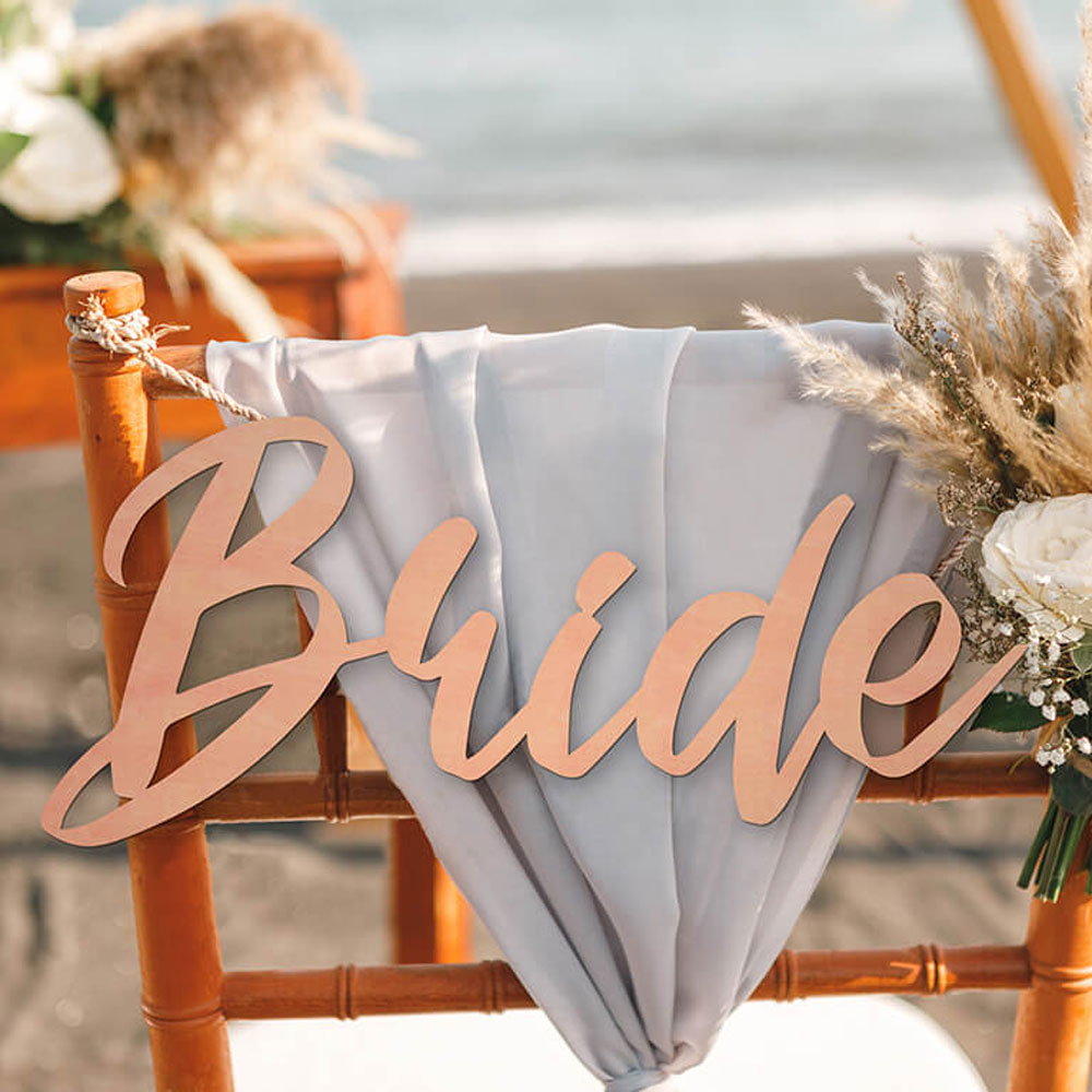 Seascape wedding scene with Bride written across