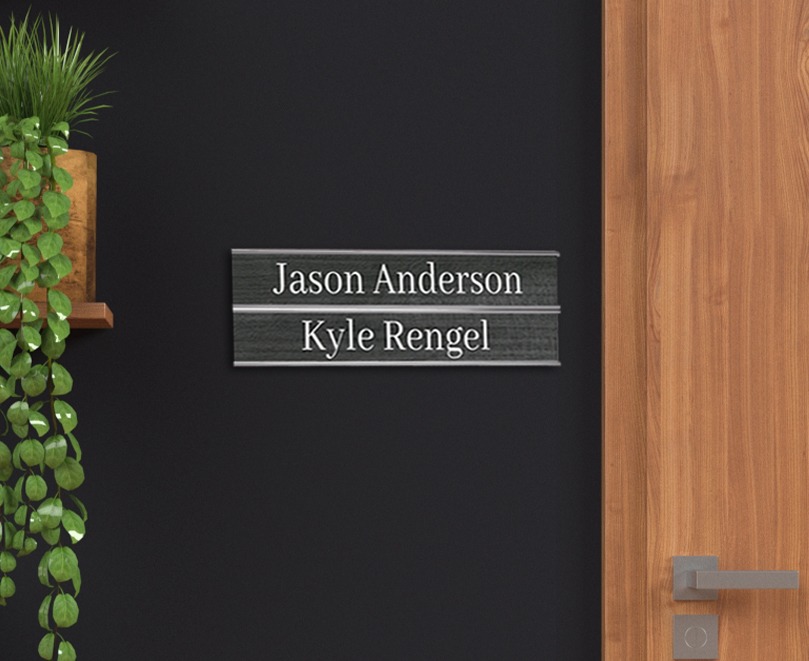 customized double nameplate holder mounted on the wall with two nameplates