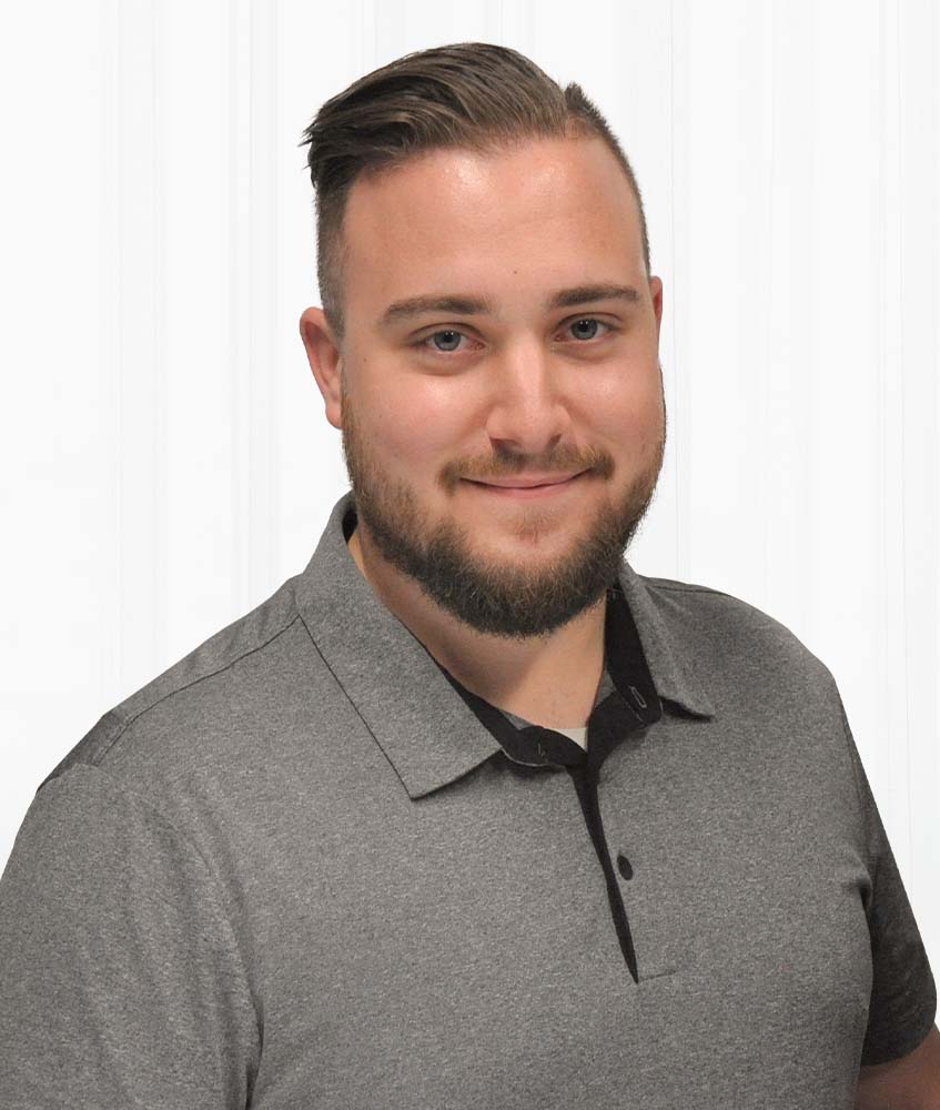 headshot of Evan Hartman
