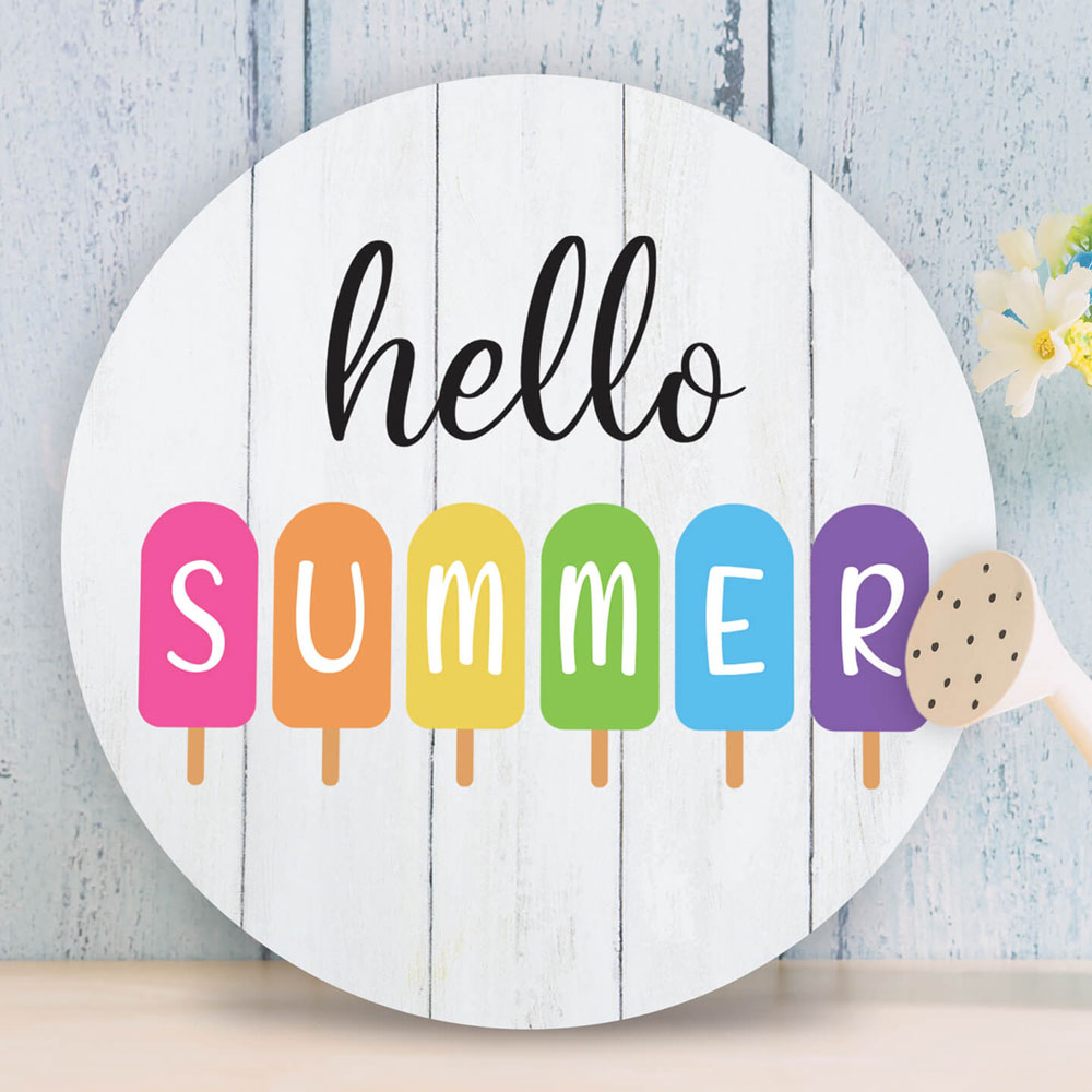 Round wooden wall hanging with Hello Summer on the front