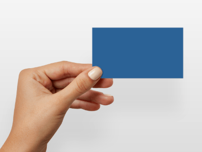 hand holding blue fabricated blank