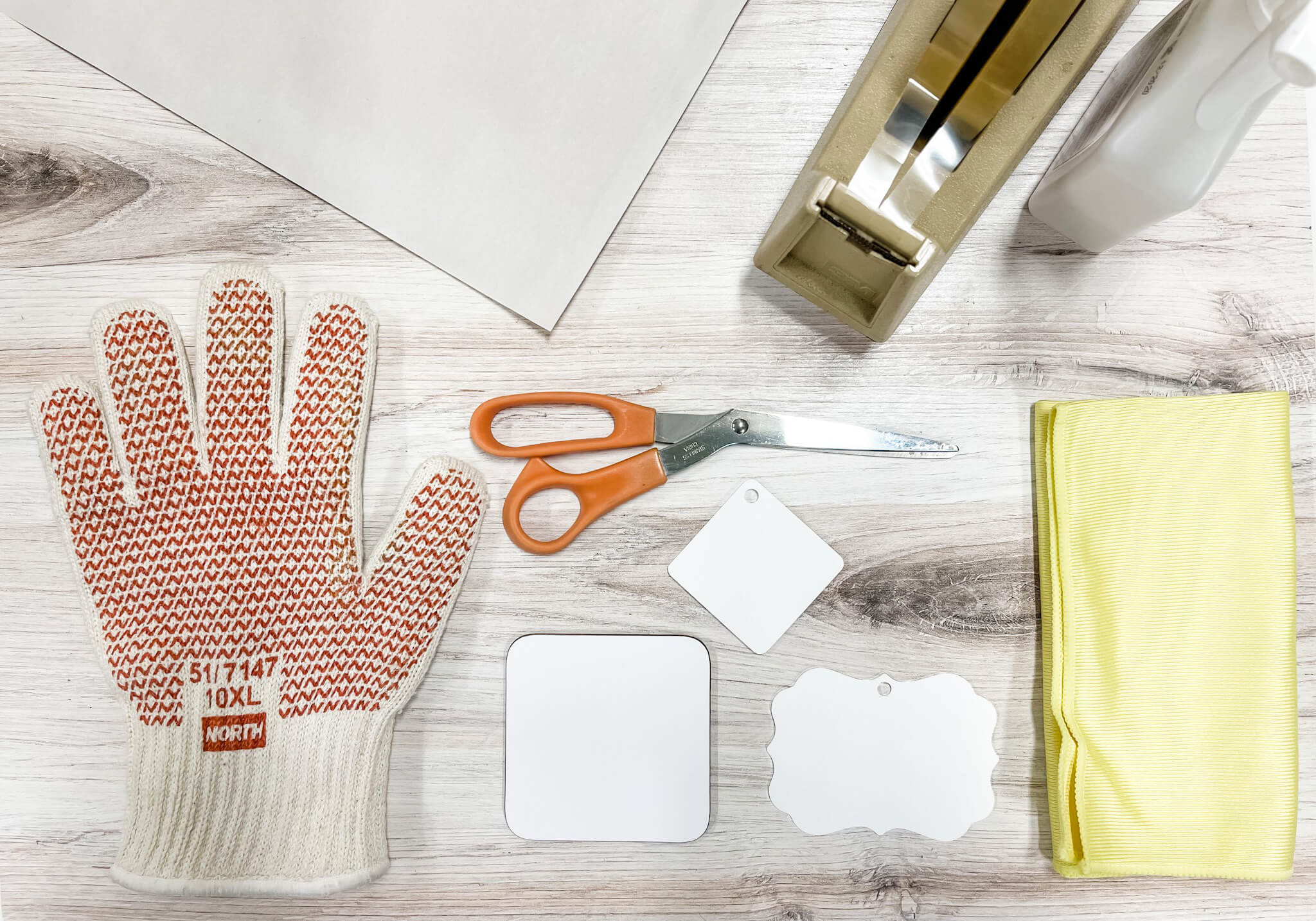 Tools needed for the projects, substrate, printed transfer, heat tape, cleaning cloth, cleaner, heat glove, scissors, and blowout paper