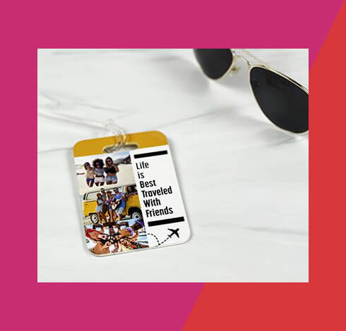 luggage tag customized with photos and a quote, sitting on a white background near a pair of sunglasses